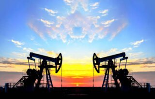 Oil drilling derricks at desert oilfield for fossil fuels output and crude oil production from the ground. Oil drill rig and pump jack background, texture.